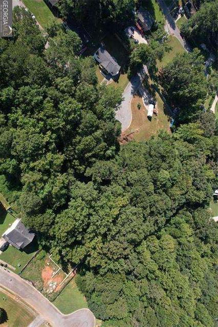 9142 Ford Street Southwest Covington, GA 30014 - Photo 10 of 15 an aerial view of a house with a yard and covered with lake view