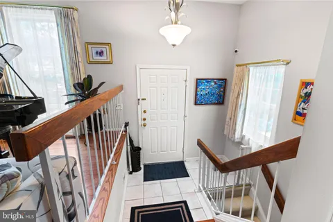 a view of entryway with a front door