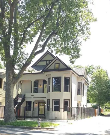 a front view of a house with a porch