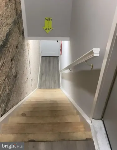 a view of bathroom with a sink and a toilet