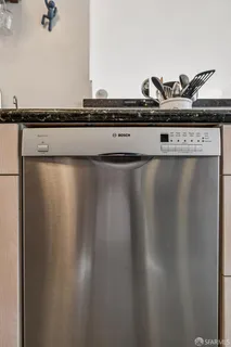 a view of a town with mountains in the background