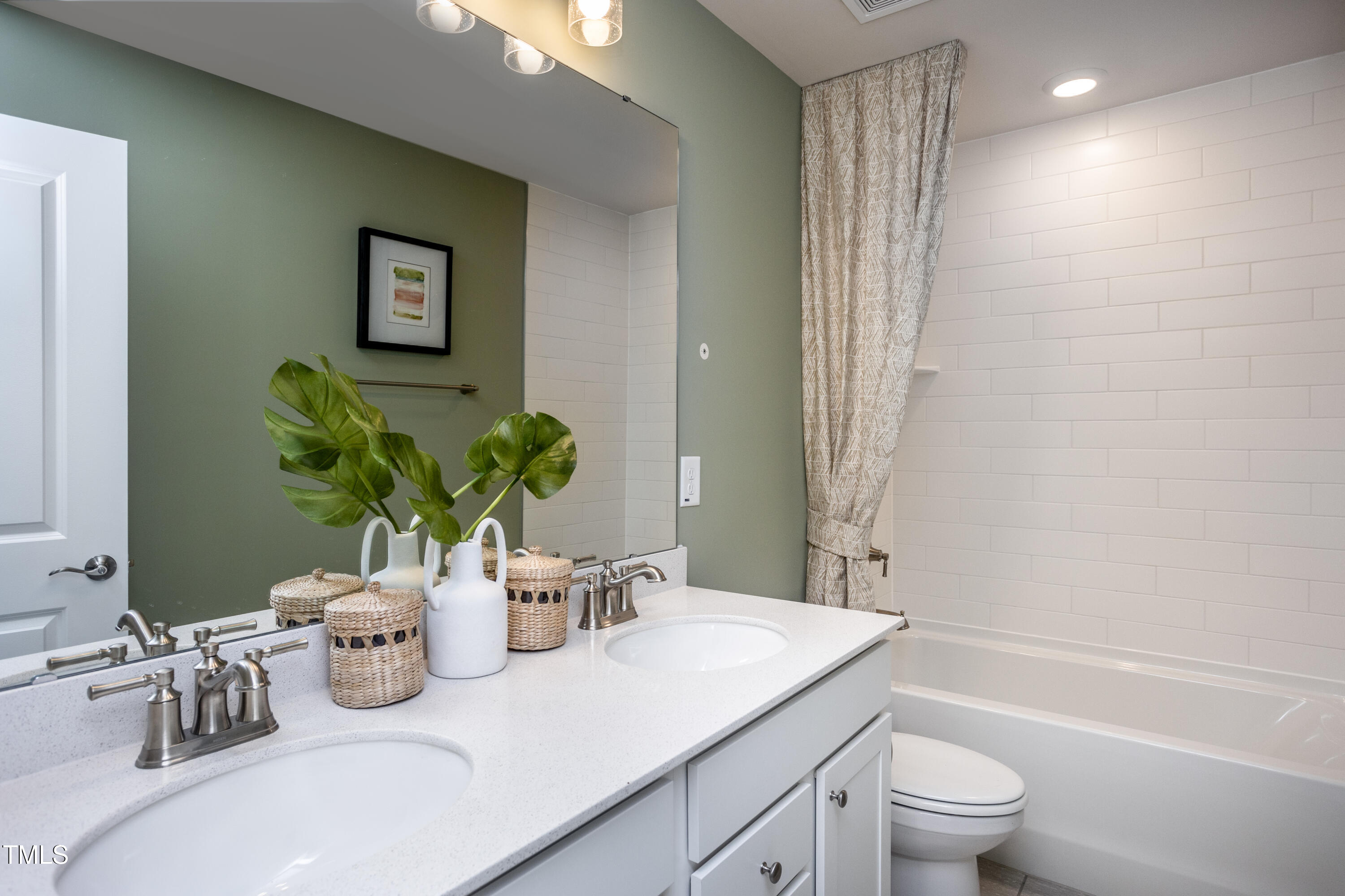 773 Denburn Place Raleigh, NC 27603 - Photo 10 of 27 a bathroom with a granite countertop sink a toilet and a bathtub