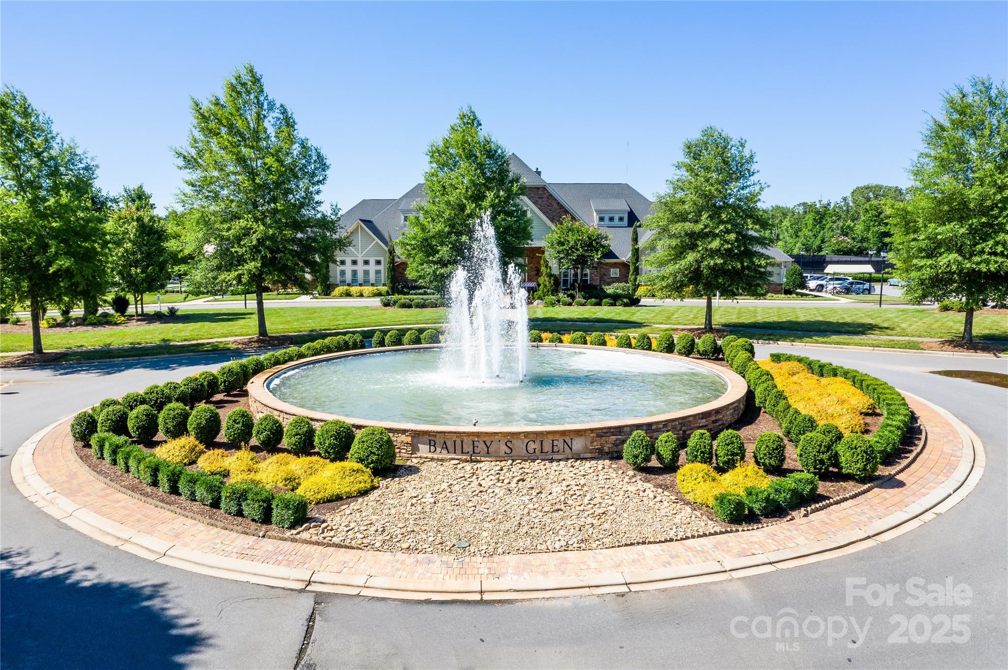 12821 Mayes Road Huntersville, NC 28078 - Photo 3 of 17 a view of a swimming pool with a patio and a garden