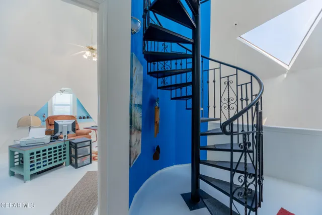 a bedroom with bunk bed and a wooden floor