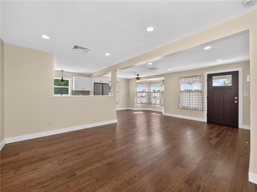 291 East Dannersville Road Bath, PA 18014 - Photo 26 of 46 Rich hardwood floors flow through this welcoming open-concept living area and kitchen, perfect for entertaining.