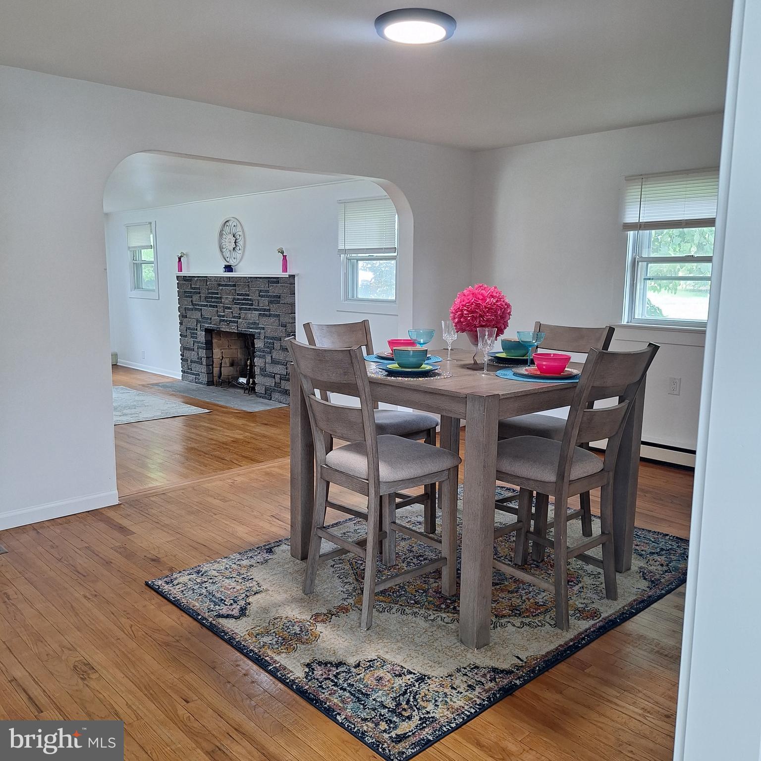 734 Pulaski Highway Bear, DE 19701 - Photo 2 of 20 a dining room with furniture and wooden floor