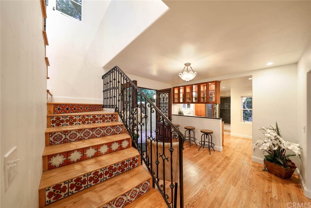 1107 Coast View Drive Laguna Beach, CA 92651 - Photo 17 of 48 a view of entryway and hall with wooden floor