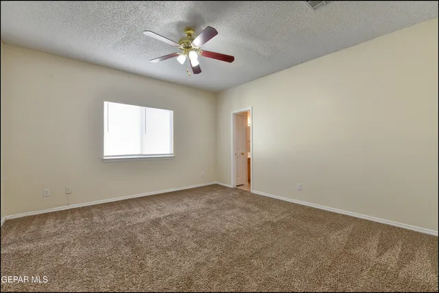 an aerial view of a parking space