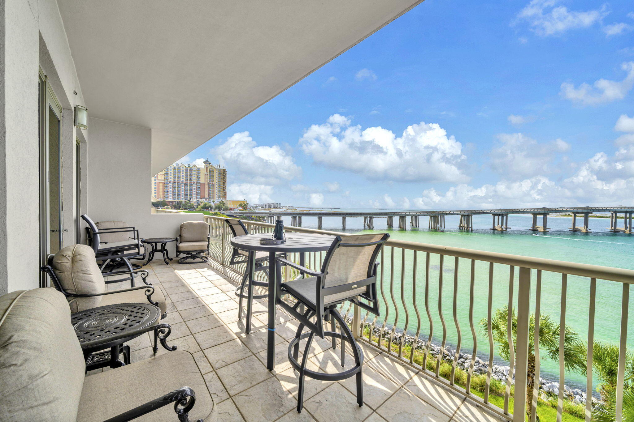 5 Calhoun Avenue, Unit 403 Destin, FL 32541 - Photo 17 of 35 a view of a swimming pool with furniture