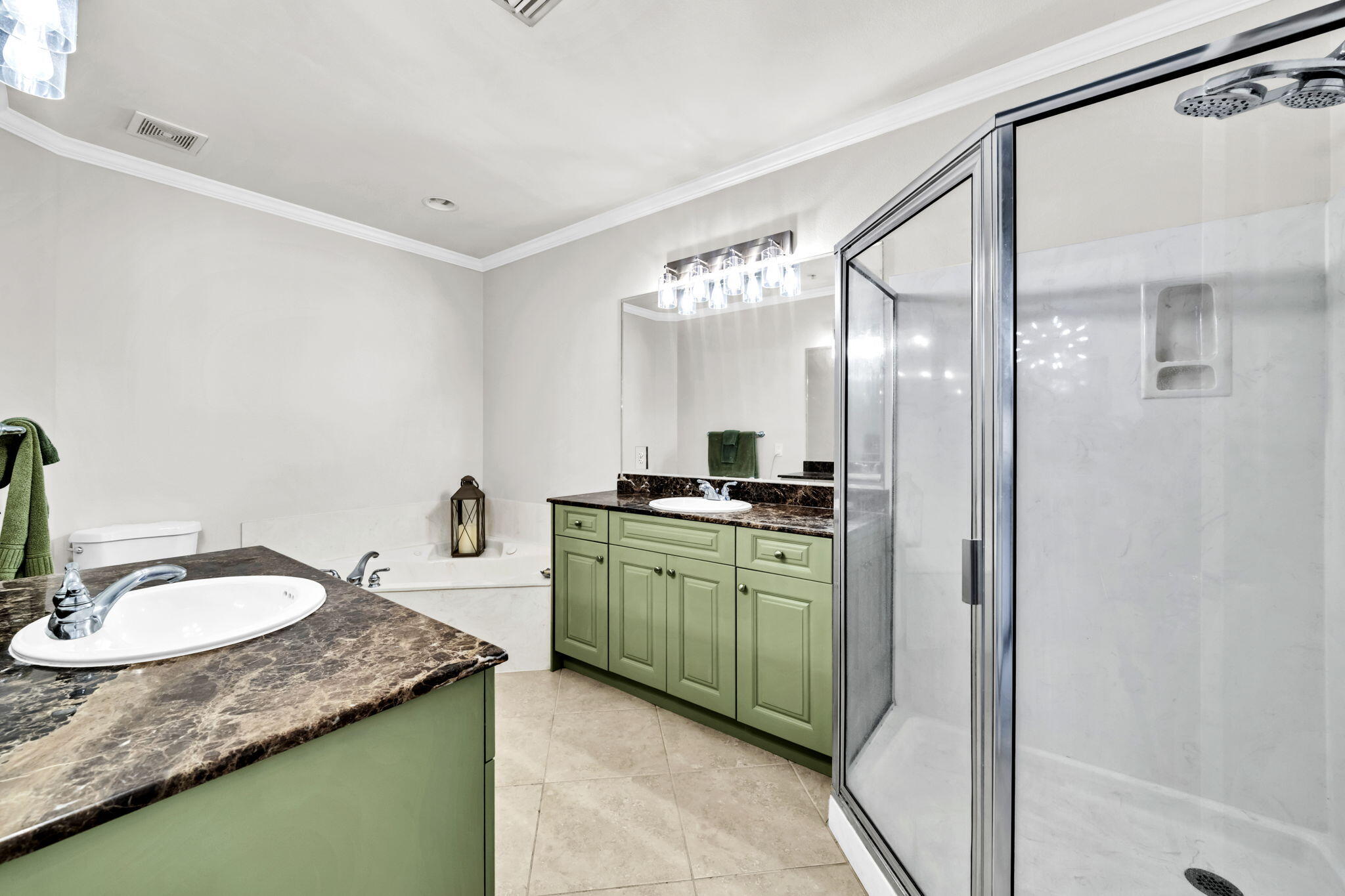 5 Calhoun Avenue, Unit 403 Destin, FL 32541 - Photo 25 of 35 a bathroom with a granite countertop sink a mirror and a shower