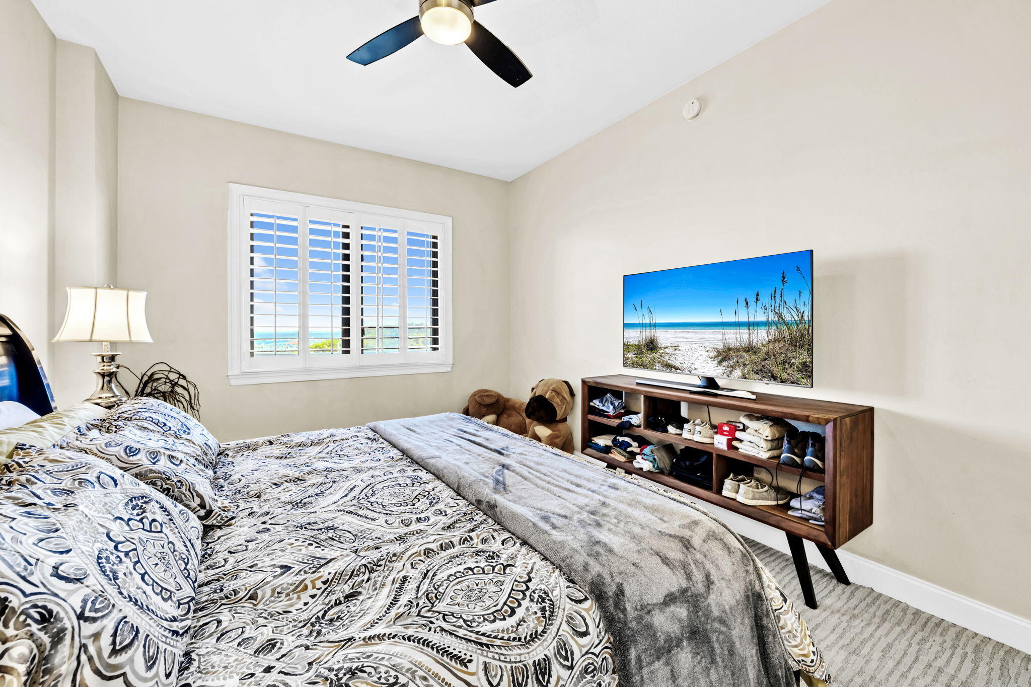 5 Calhoun Avenue, Unit 403 Destin, FL 32541 - Photo 10 of 35 a bedroom with a bed and a tv