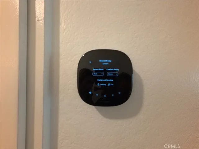 a bathroom with a toilet and a bath tub