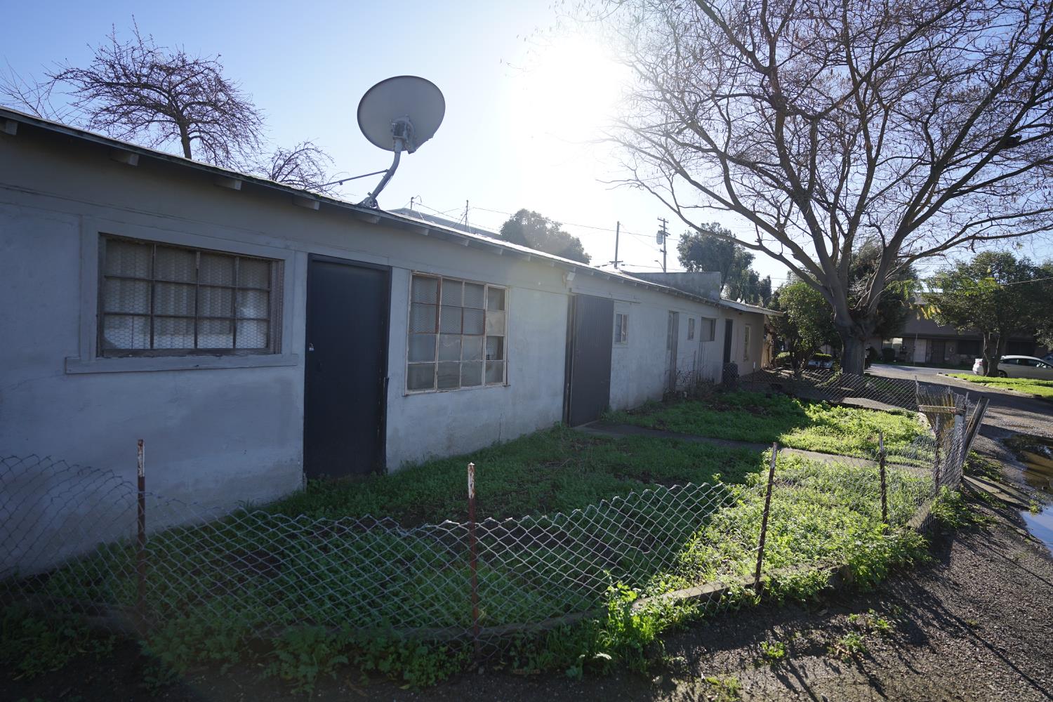 1403 Leonard Avenue Modesto, CA 95350 - Photo 4 of 6 a front view of a house with garden