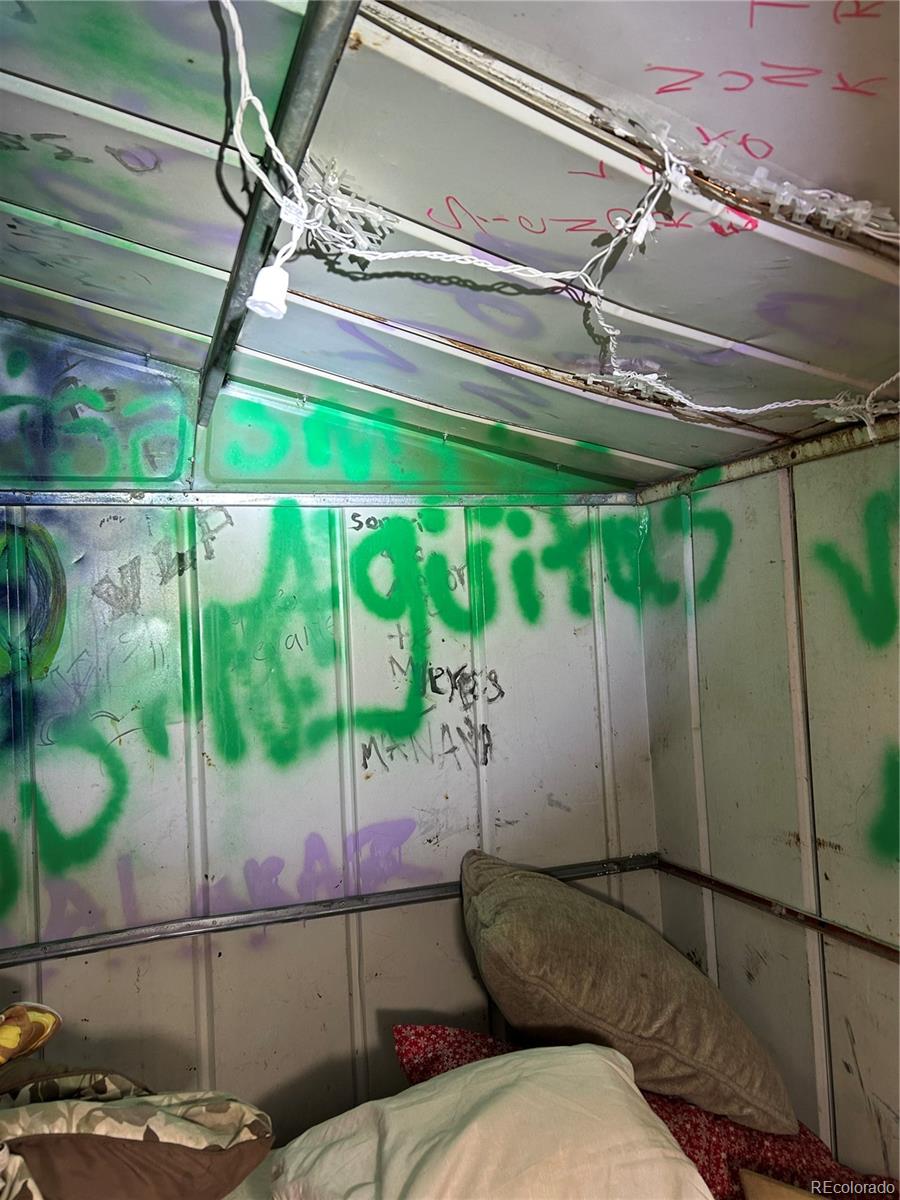 9111 Monroe Street Thornton, CO 80229 - Photo 17 of 39 a bathroom with a granite countertop sink and a mirror