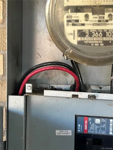 a view of gym equipment with wooden floor