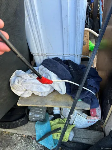 a view of a room with furniture and a fireplace