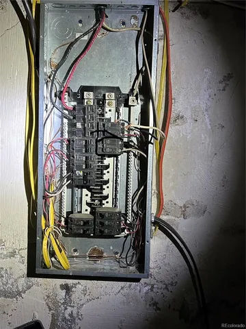 a bathroom with a sink mirror vanity and toilet