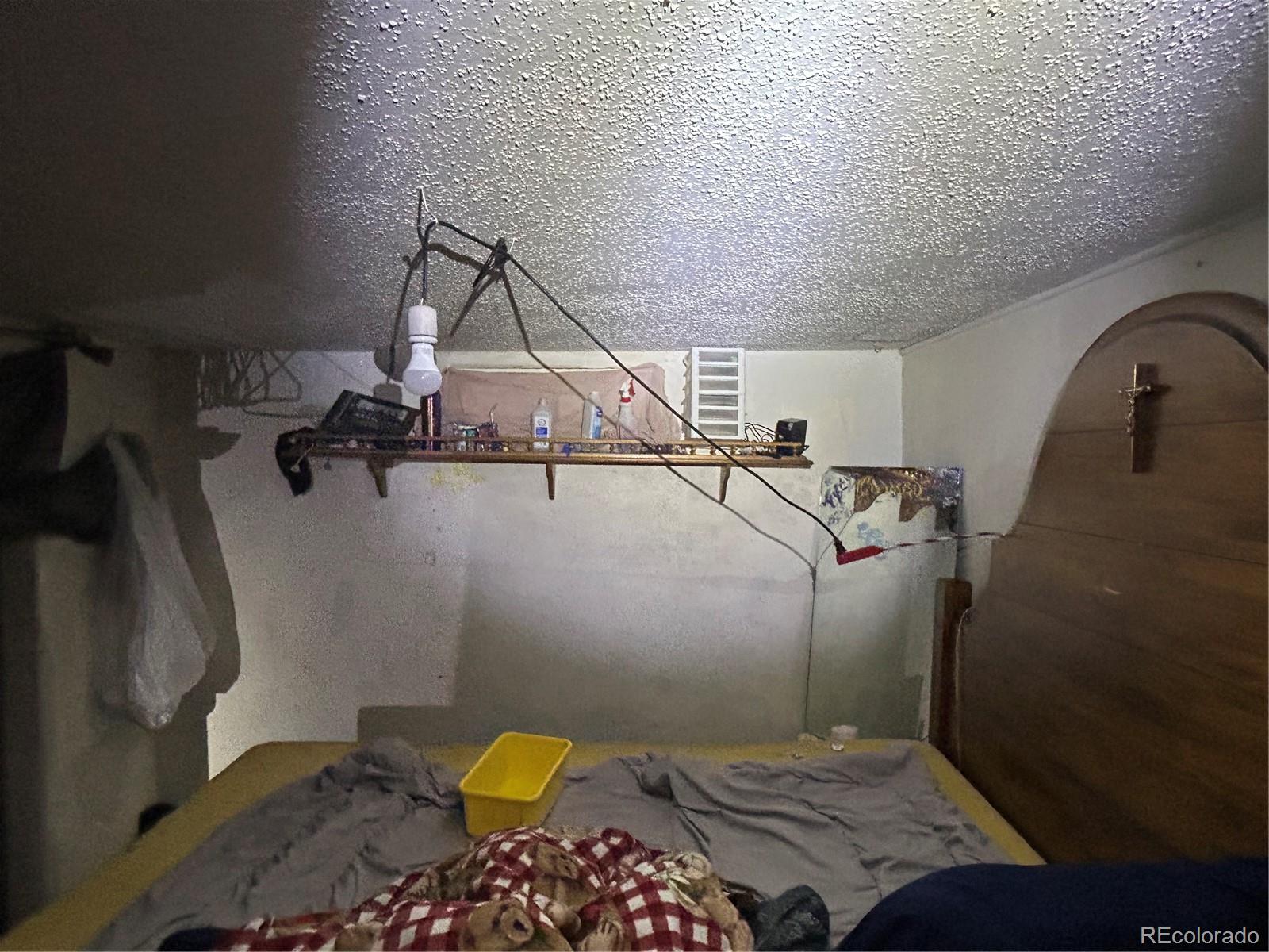 9111 Monroe Street Thornton, CO 80229 - Photo 35 of 39 a bathroom with a sink mirror vanity and toilet