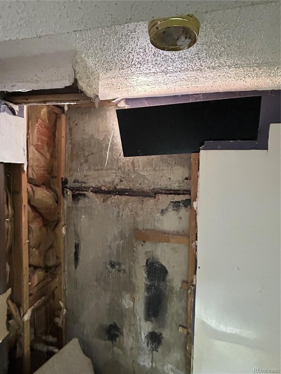 9111 Monroe Street Thornton, CO 80229 - Photo 36 of 39 a bathroom with a sink and mirror