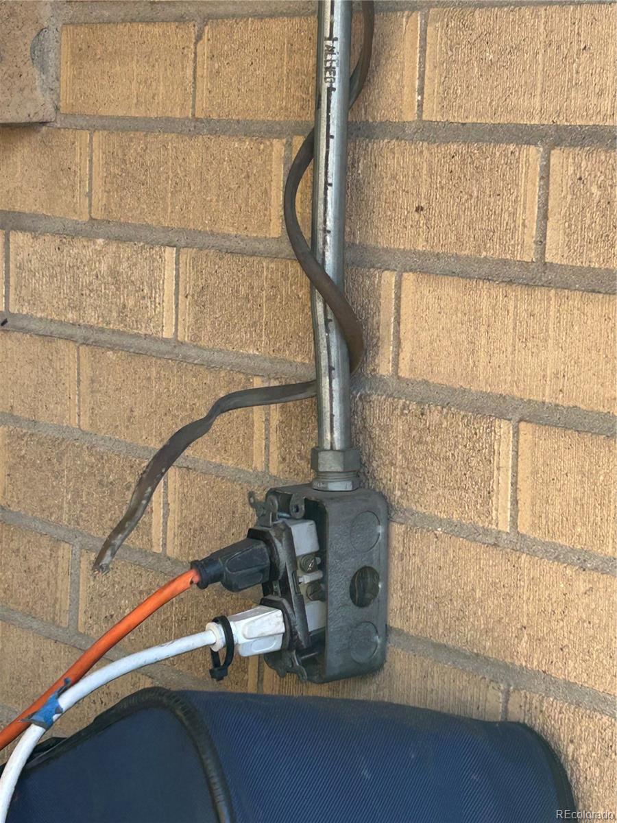 9111 Monroe Street Thornton, CO 80229 - Photo 7 of 39 a blue and white view of a window