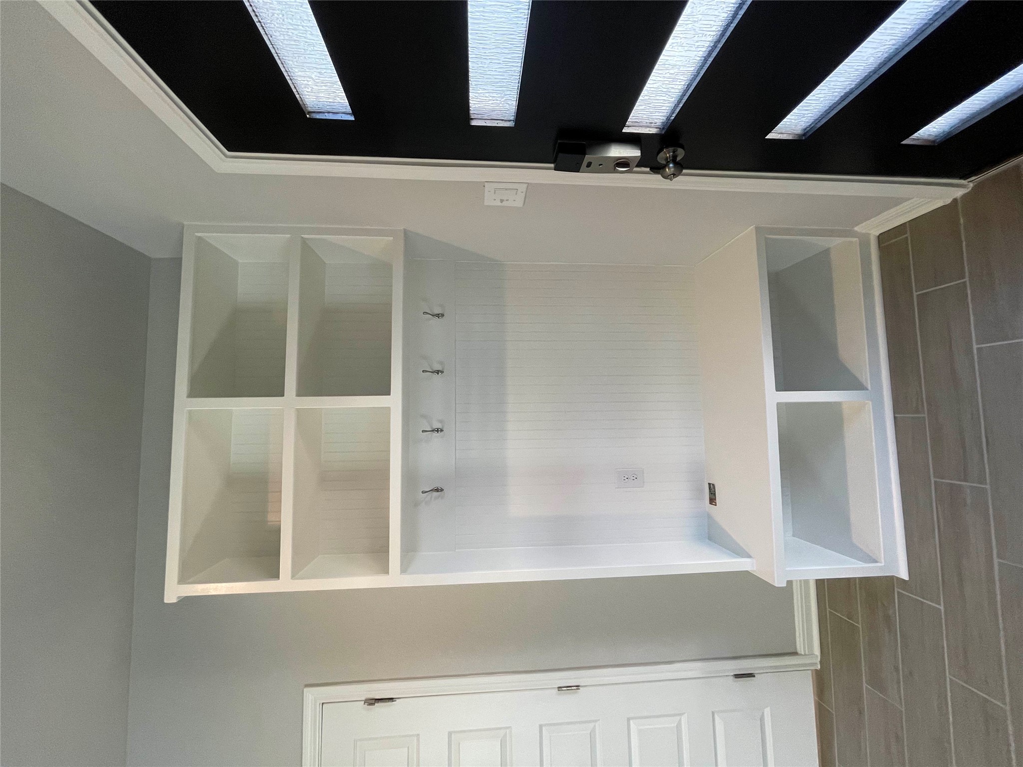 125 Unforgiven Lane Jarrell, TX 76537 - Photo 15 of 17 Mudroom with baseboards and wood tiled floors