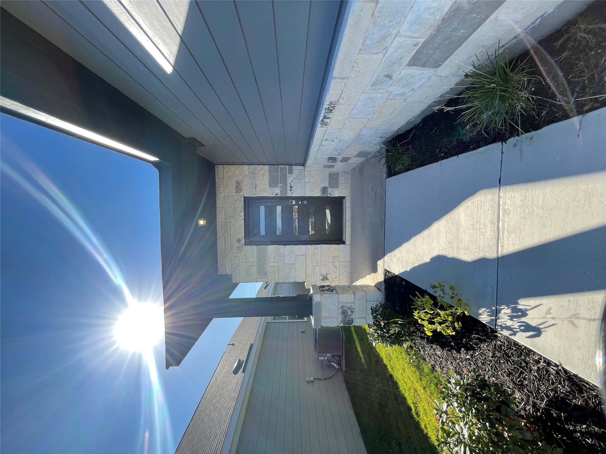 125 Unforgiven Lane Jarrell, TX 76537 - Photo 2 of 17 Doorway to property with stone siding