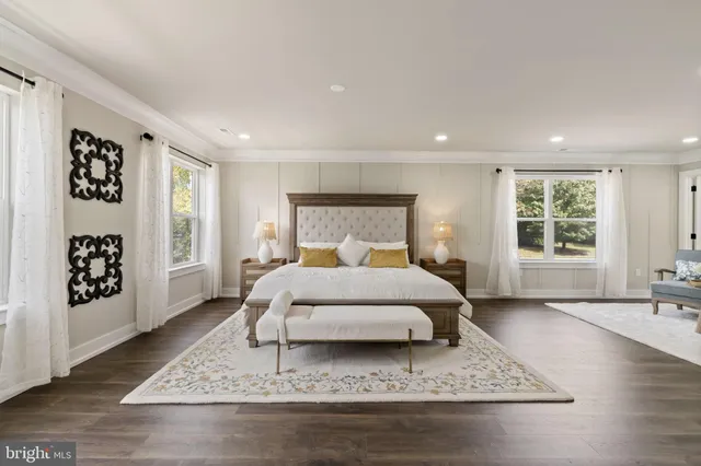 a white bath tub sitting next to a window
