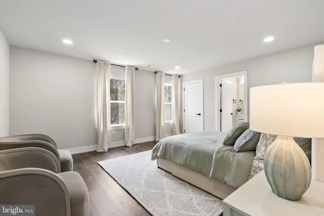 an empty room with wooden floor