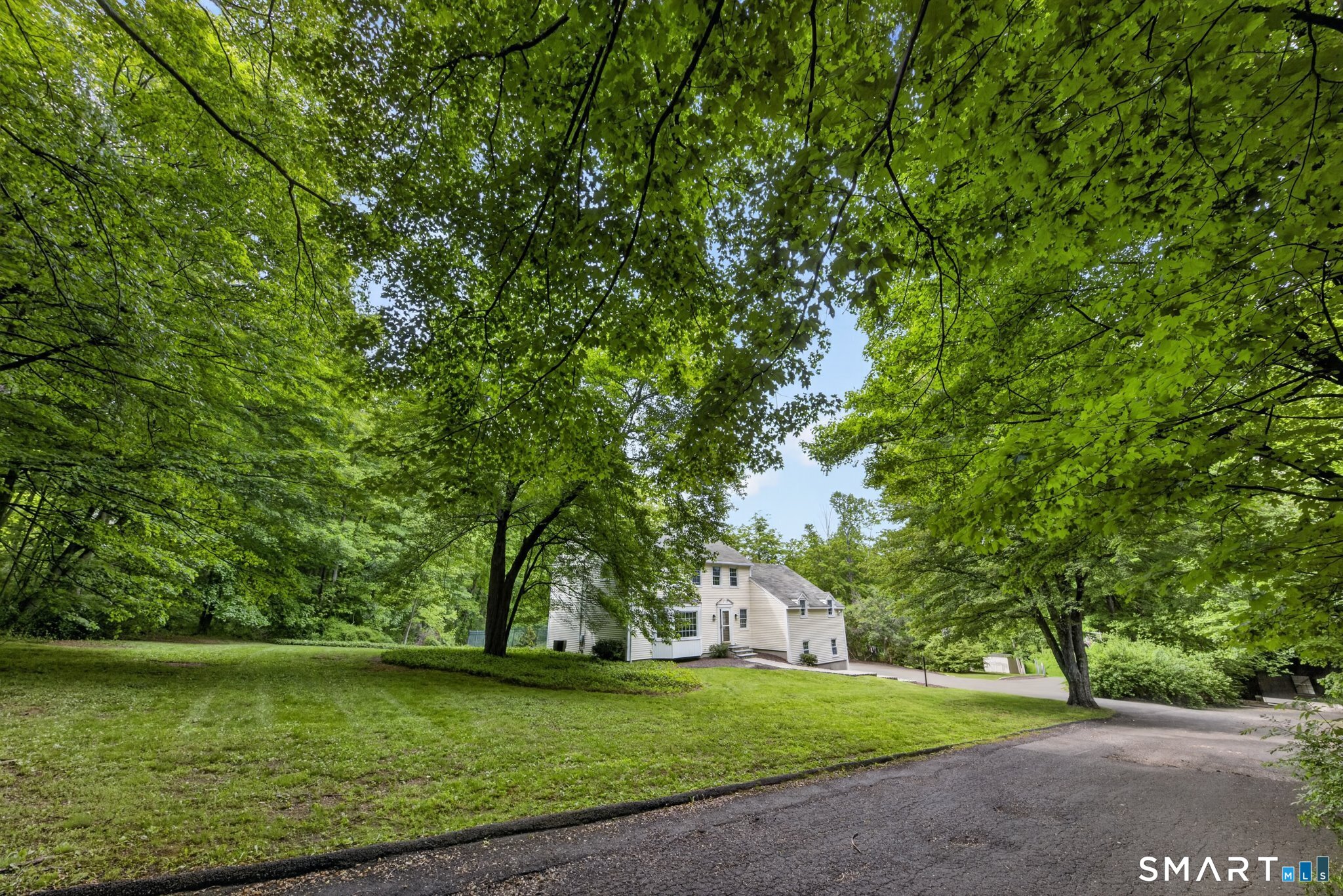 70 Barrack Hill Road Ridgefield, CT 06877 - Photo 28 of 32 a view of a field with a tree