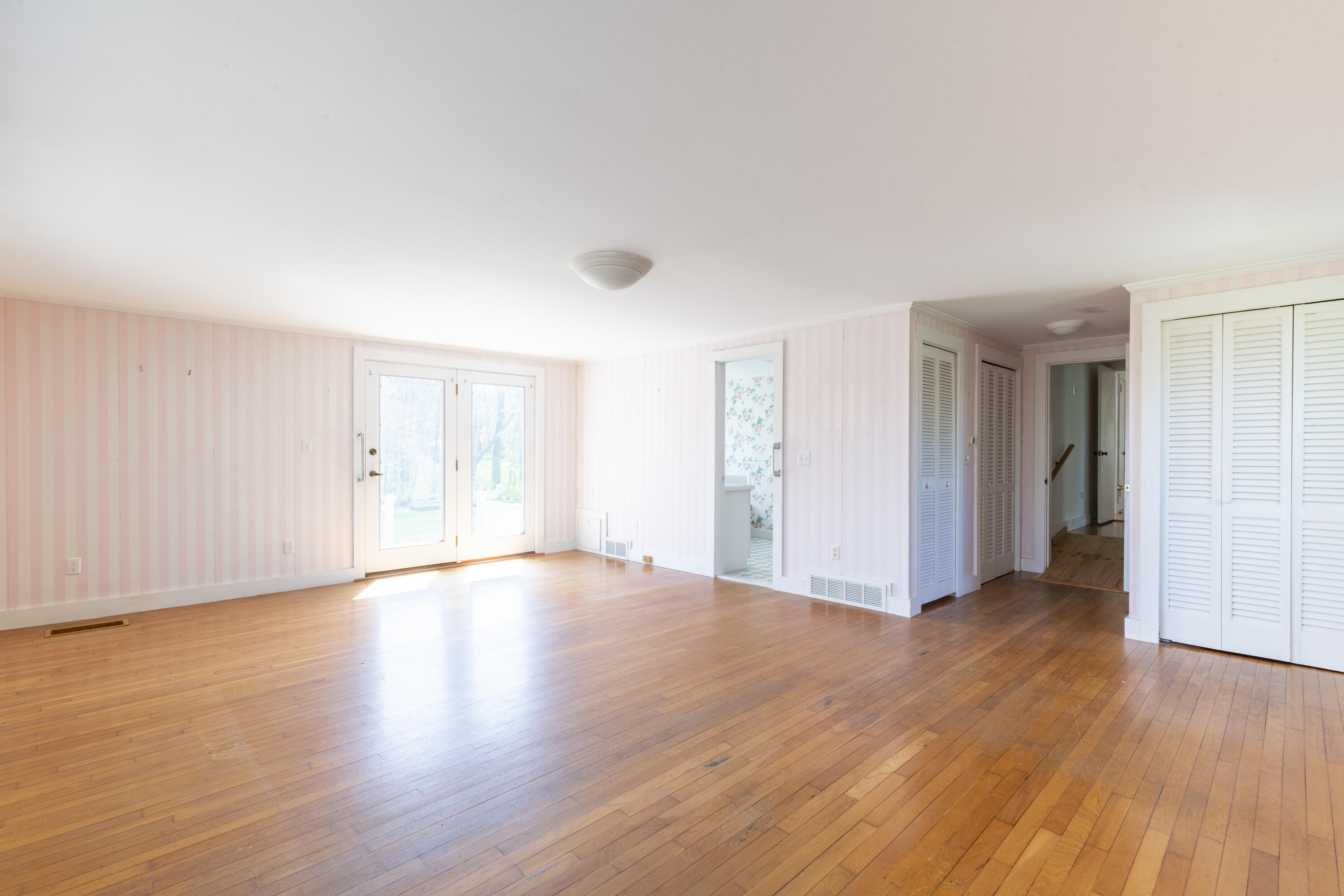 2955 Main Street Barnstable, MA 02630 - Photo 12 of 35 a view of an empty room with window and wooden floor