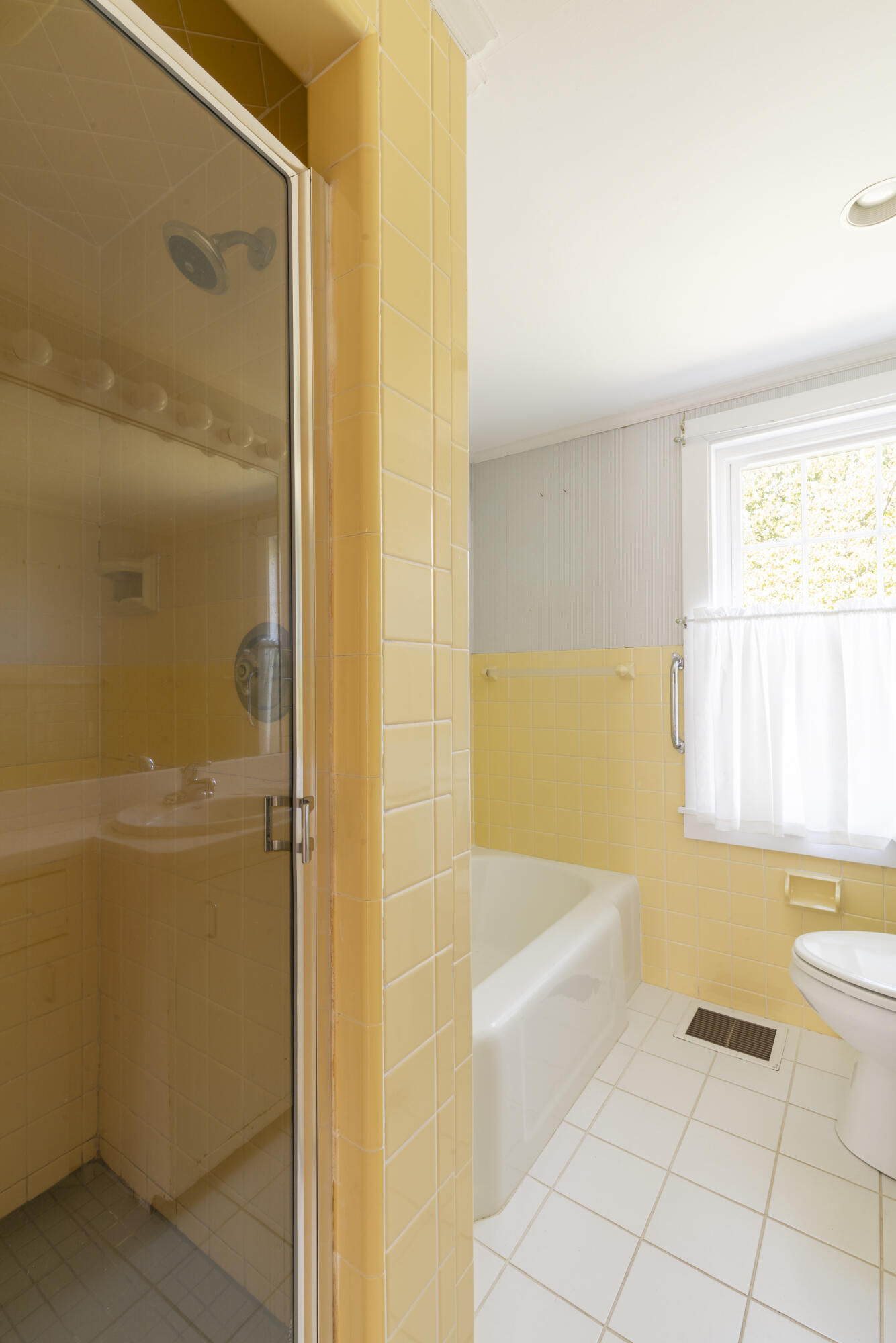 2955 Main Street Barnstable, MA 02630 - Photo 25 of 35 a bathroom with a bathtub and a shower