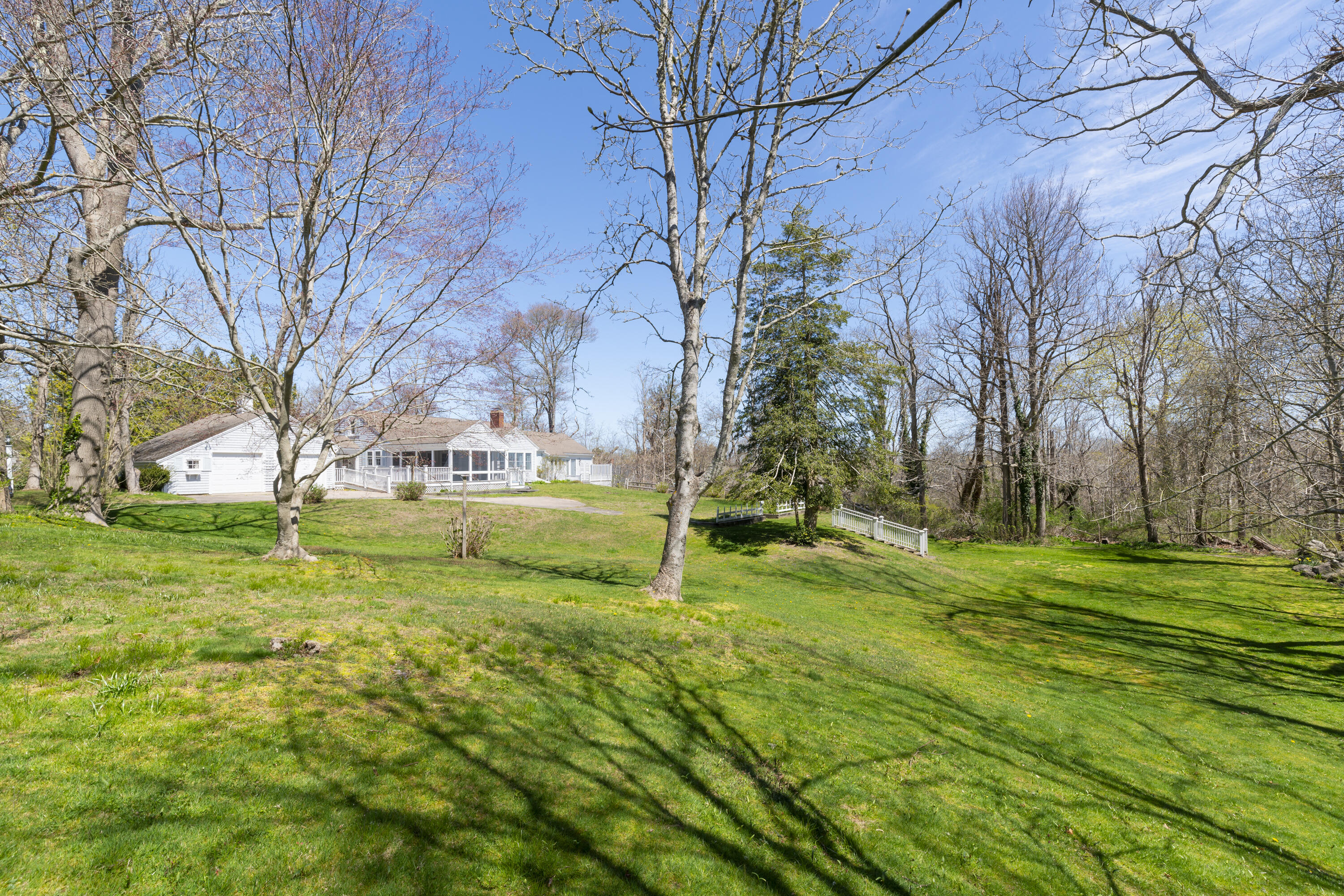 2955 Main Street Barnstable, MA 02630 - Photo 31 of 35 a green field with lots of trees