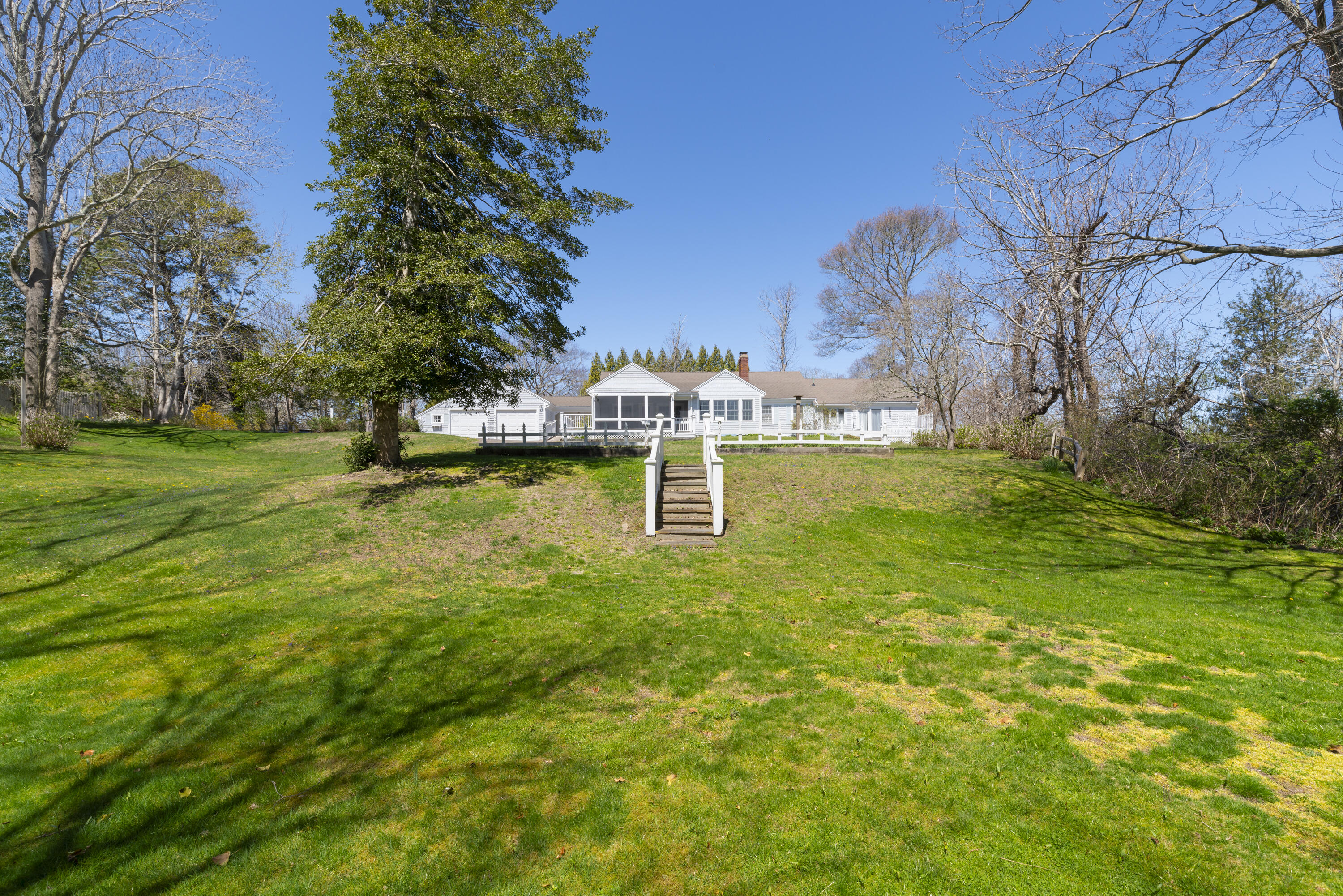 2955 Main Street Barnstable, MA 02630 - Photo 7 of 35 a view of a swimming pool with a yard