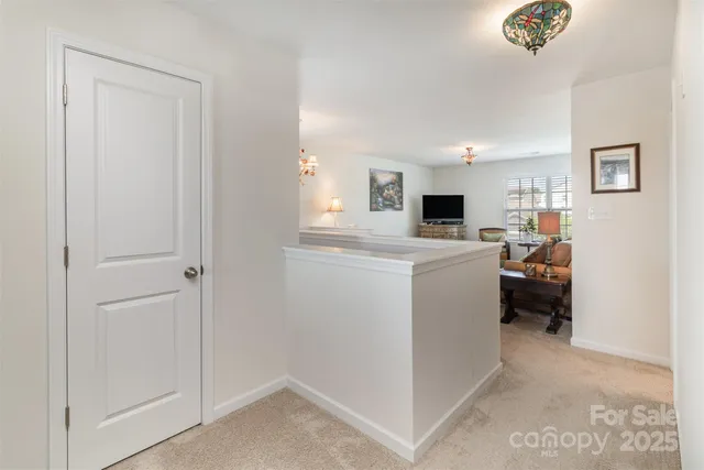 a kitchen with a stove and a refrigerator