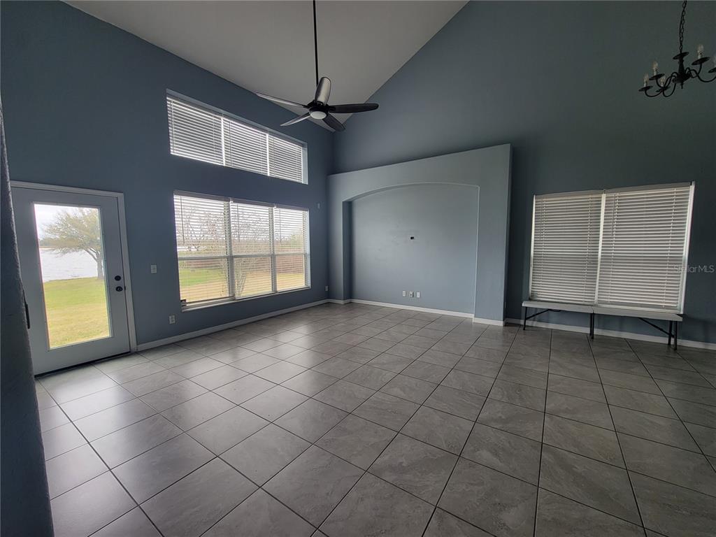 2734 Rochelle Drive Winter Haven, FL 33881 - Photo 13 of 38 a view of an empty room with a window
