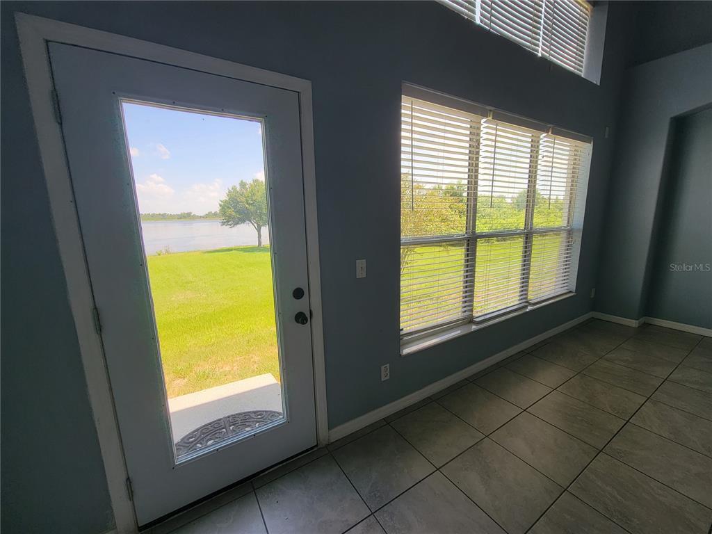 2734 Rochelle Drive Winter Haven, FL 33881 - Photo 14 of 38 a view of an empty room with a window