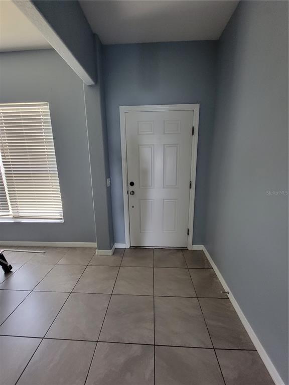 2734 Rochelle Drive Winter Haven, FL 33881 - Photo 2 of 38 a view of a livingroom with a window