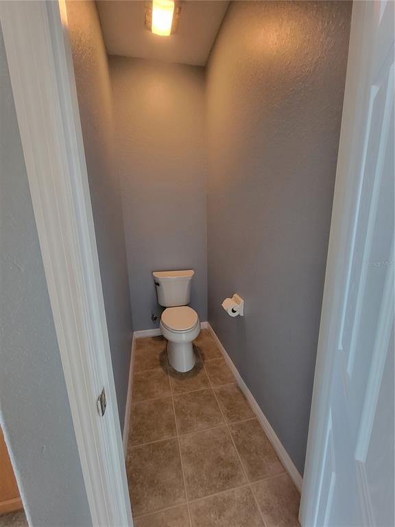2734 Rochelle Drive Winter Haven, FL 33881 - Photo 21 of 38 a bathroom with a sink and a toilet