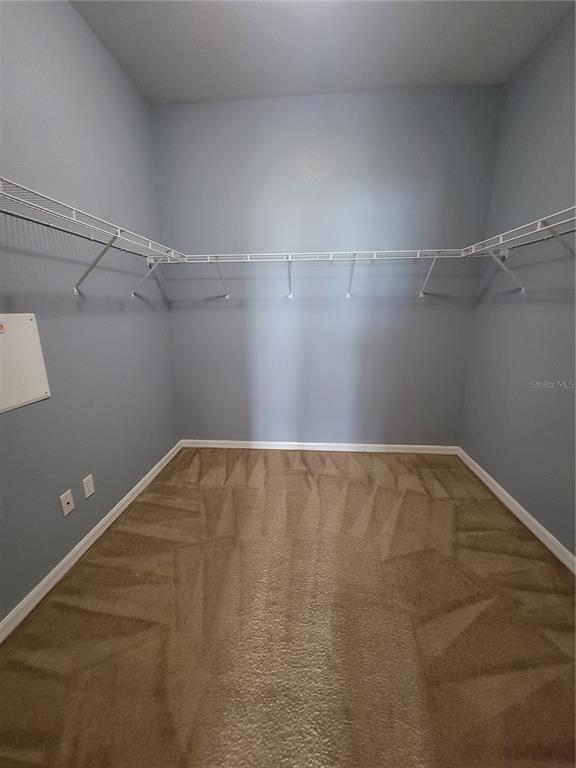 2734 Rochelle Drive Winter Haven, FL 33881 - Photo 22 of 38 a view of a room with racks on the wall