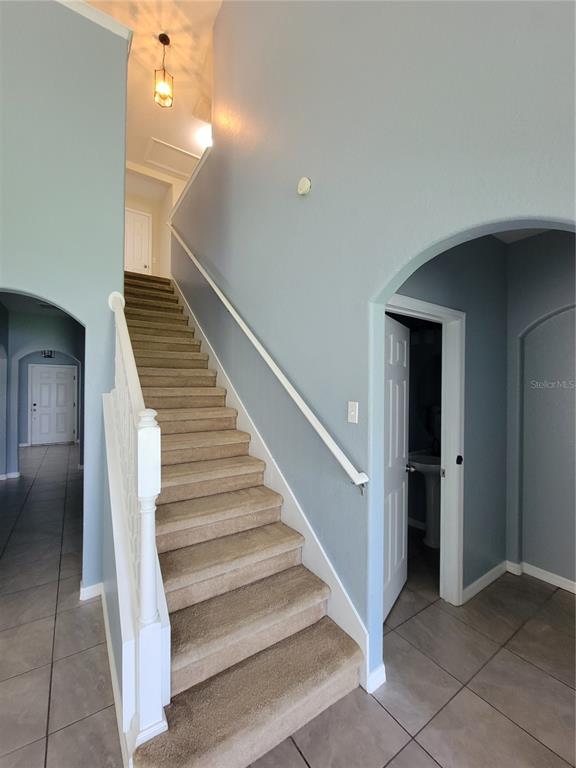 2734 Rochelle Drive Winter Haven, FL 33881 - Photo 23 of 38 a view of entryway and hall with a rug