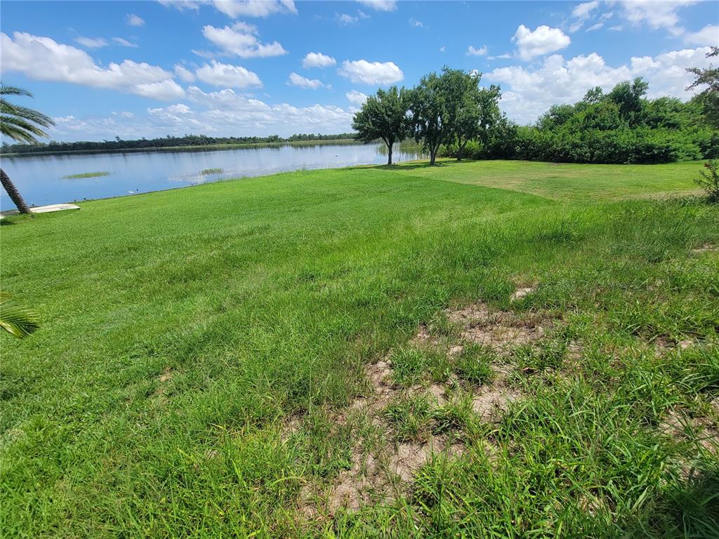2734 Rochelle Drive Winter Haven, FL 33881 - Photo 38 of 38 a view of a lake with a big yard