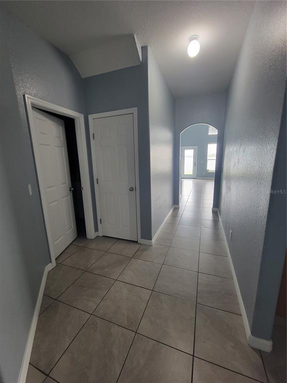 2734 Rochelle Drive Winter Haven, FL 33881 - Photo 4 of 38 a view of gallery with wooden floor