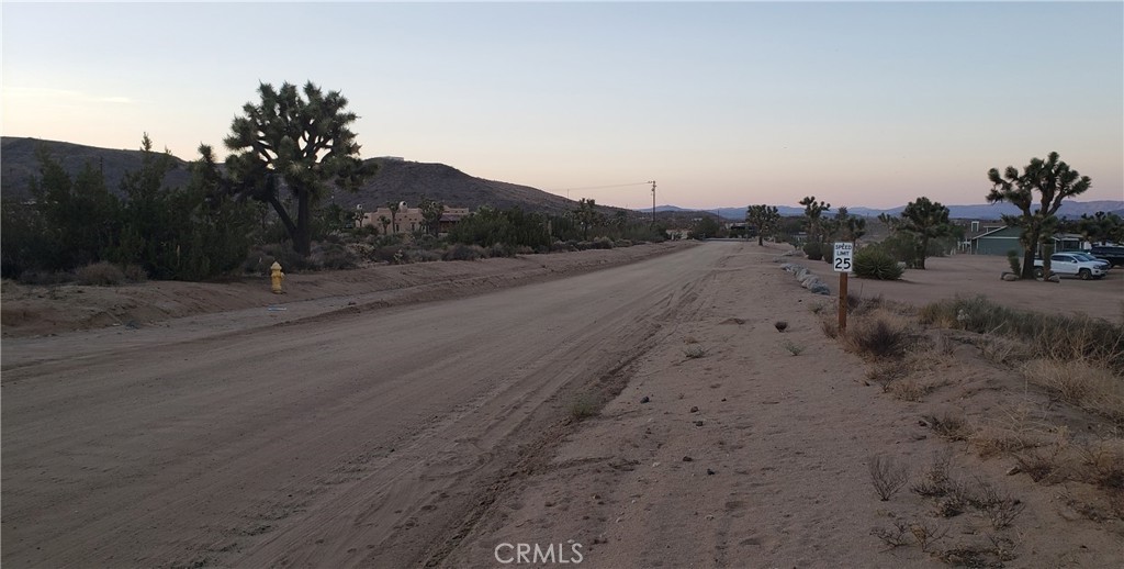 1234 Canton Street Yucca Valley, CA 92284 - Photo 19 of 27 a view of a road with a mountain