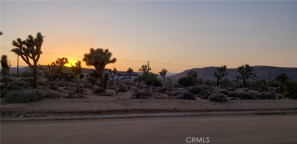1234 Canton Street Yucca Valley, CA 92284 - Photo 21 of 27 a view of a town with mountains in the background