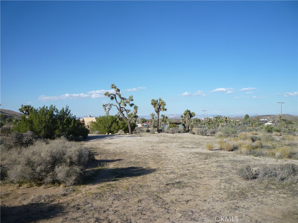 1234 Canton Street Yucca Valley, CA 92284 - Photo 26 of 27 a view of a road with a building in the background