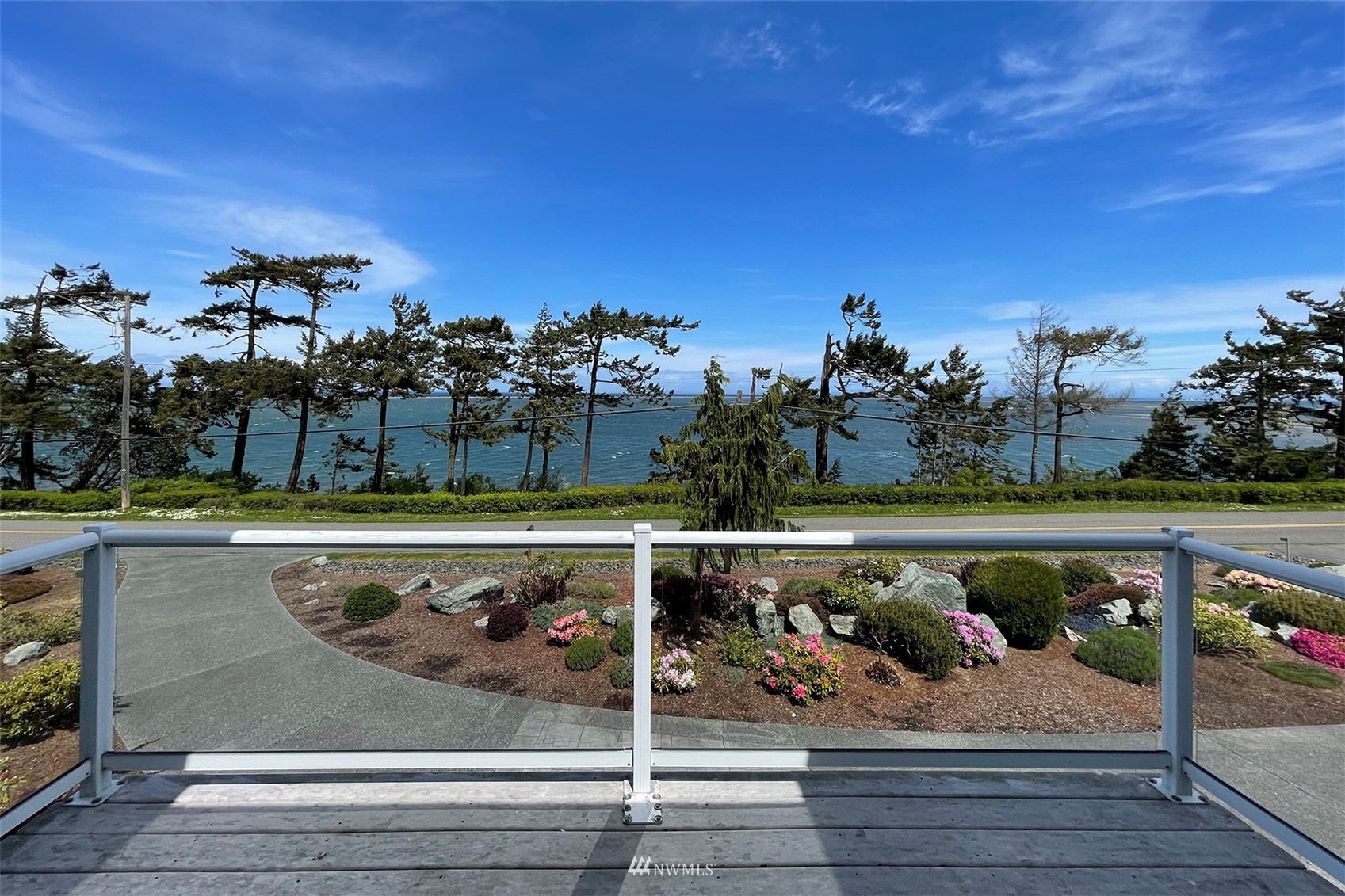 402 Marine Drive Sequim, WA 98382 - Photo 19 of 40 a view of a swimming pool with a balcony