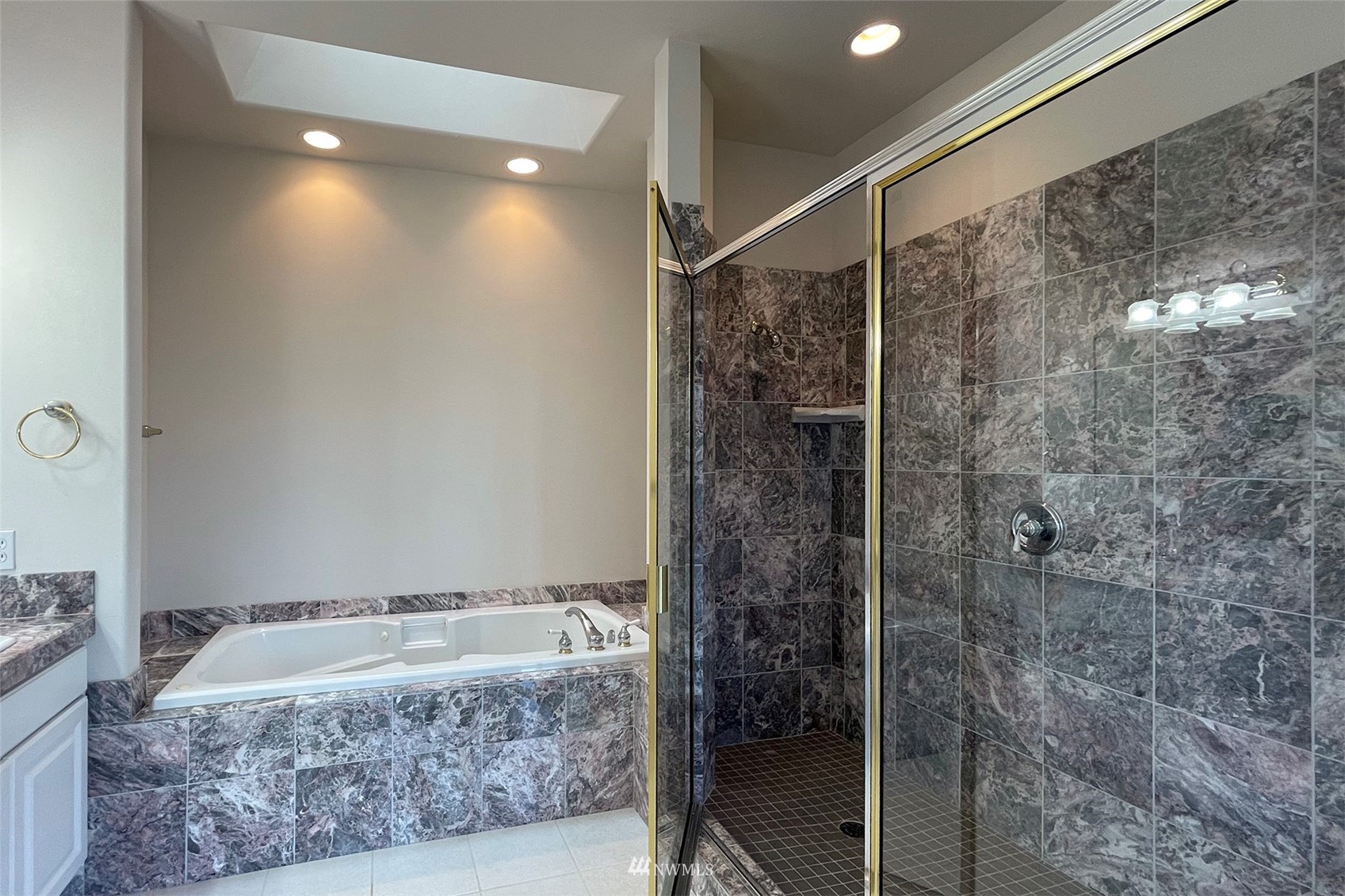 402 Marine Drive Sequim, WA 98382 - Photo 22 of 40 a bathroom with a shower and a sink