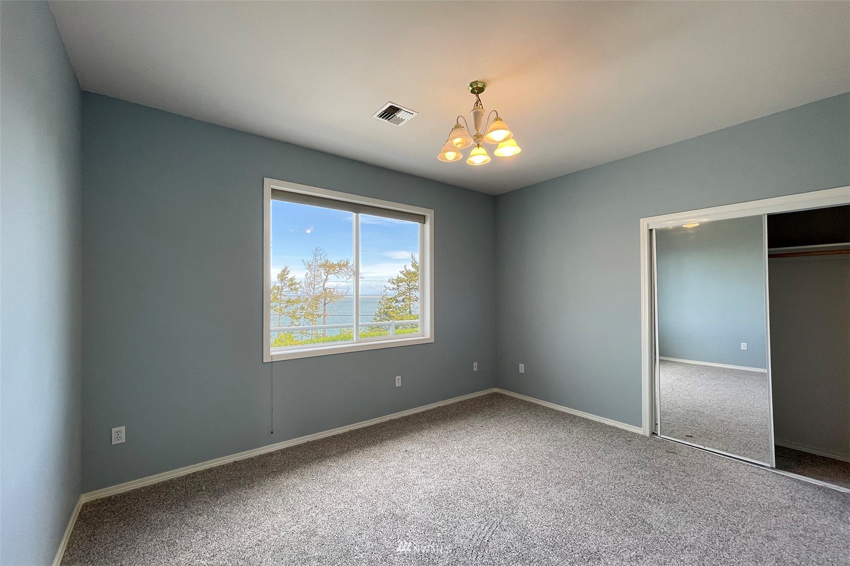 402 Marine Drive Sequim, WA 98382 - Photo 26 of 40 a view of an empty room with a window