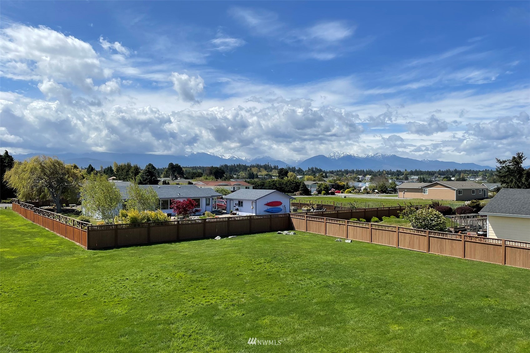 402 Marine Drive Sequim, WA 98382 - Photo 37 of 40 a view of a garden with houses