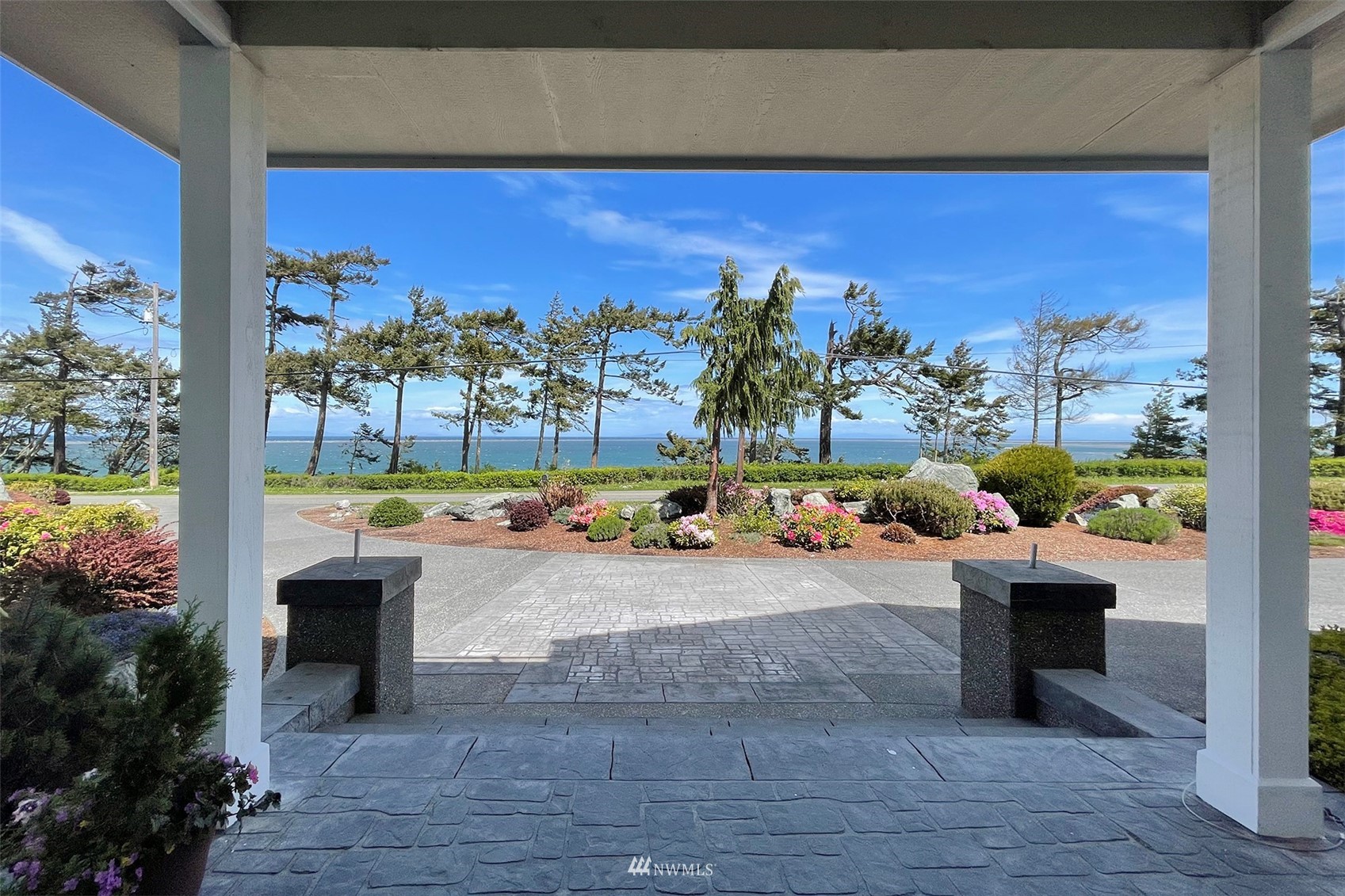 402 Marine Drive Sequim, WA 98382 - Photo 6 of 40 a view of a swimming pool with a patio